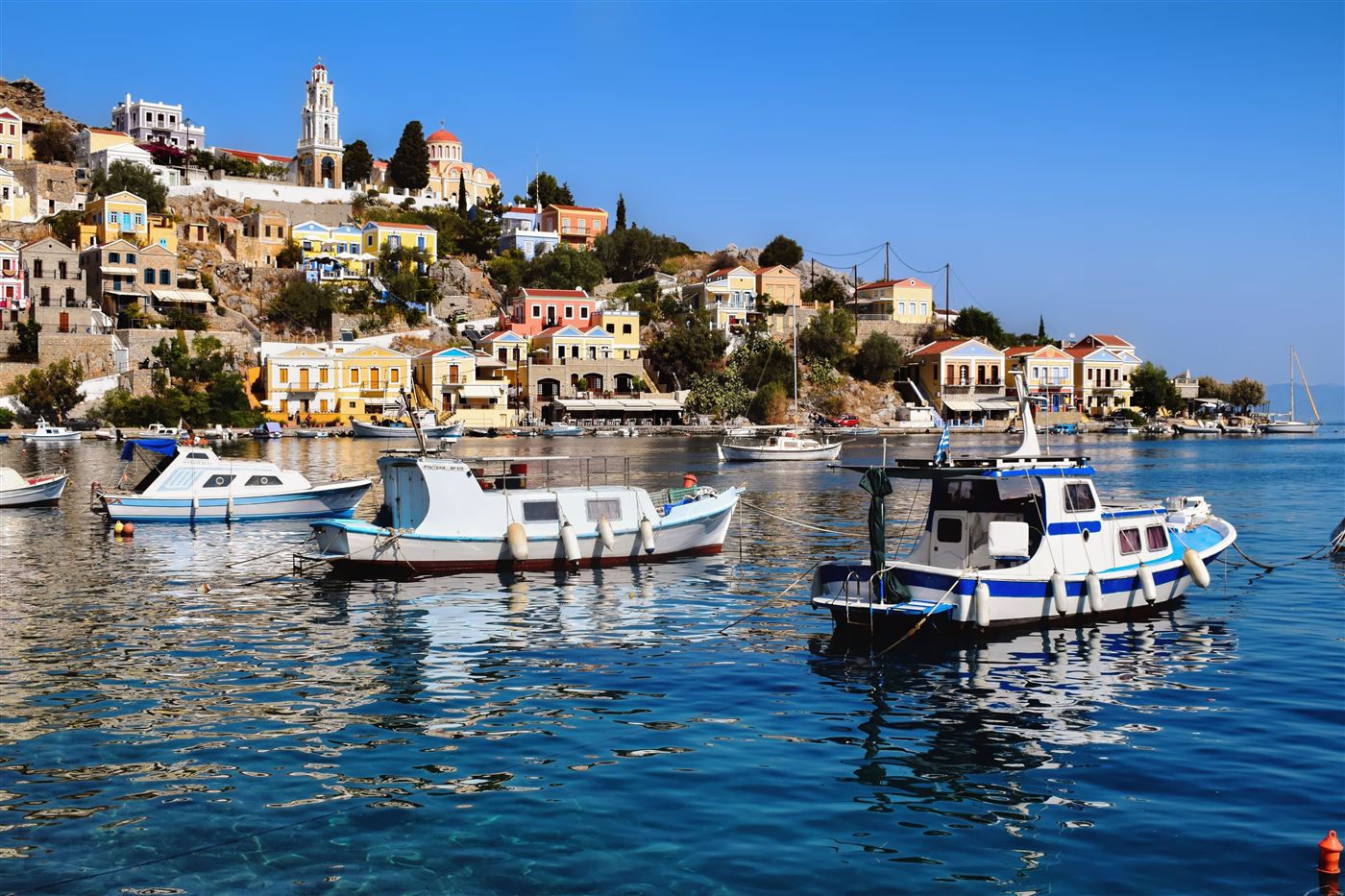 Symi harbour with pastel-coloured houses
